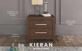 The Kieran Nightstand by Child Craft in Toasted Chestnut features baby-safe finishes, two drawers with glossy copper pulls, angled feet, and a subtle herringbone pattern—stylish and perfect for a modern nursery. Lamp and books fit easily on top.