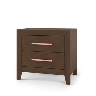 The Child Craft Kieran Nightstand in Toasted Chestnut offers two drawers, baby-safe finishes, pink handles, and angled legs, creating a modern and safe nursery nightstand with stylish appeal.
