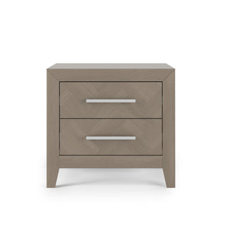 The Child Craft Kieran Nightstand in Crescent Gray features two drawers with sleek horizontal metal handles, displayed against a plain white background.