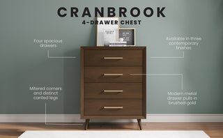 The Child Craft Cranbrook 4 Drawer Chest in Toasted Chestnut stands against a green wall. It features spacious drawers, mitered corners, canted legs, brushed gold handles, three finish options, and decor items on top.