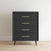 The Child Craft Cranbrook 4-Drawer Chest - Ebony is a modern dresser with gold handles and angled legs, ideal for nurseries or as mid-century decor against a white wall on light wood floors.