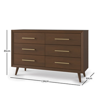 The Child Craft Cranbrook Double Dresser, Toasted Chestnut, is a mid-century modern piece with six drawers, gold handles, and angled legs—ideal for the nursery. Dimensions: 85 cm H x 134 cm W x 44 cm D.