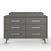 The Child Craft Cranbrook Double Dresser in Lunar Gray features six drawers, slender silver handles, angled legs, and an elevated tray on the back right—modern nursery furniture shown against a white background.