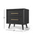 The Child Craft Cranbrook Nightstand, Ebony, is a mid-century modern piece with gold handles and angled legs, measuring 25