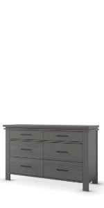 The Child Craft Denman Double Dresser in Midnight Gray features six drawers in two rows of three, each with a sleek horizontal handle. With a modern, simple design, straight lines, and sturdy legs, it’s both stylish and functional.