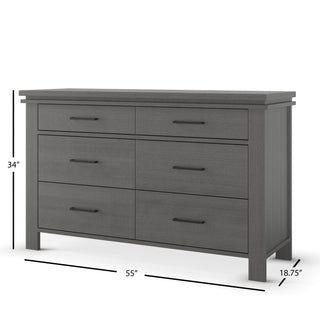 The Child Craft Denman Double Dresser in Midnight Gray features a modern rectangular design with six drawers, black handles, and measures 34" tall, 55" wide, and 18.75" deep.