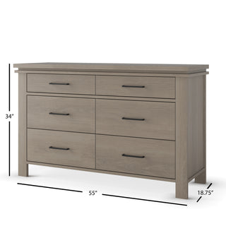 The Child Craft Denman Double Dresser in Crescent Gray features six drawers, black handles, and clean lines. It measures 34"H x 55"W x 18.75"D, with dimensions labeled on the dresser’s sides.
