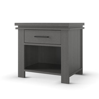 The Child Craft Denman Nightstand in Midnight Gray features a single drawer with a black handle and an open shelf, shown against a white background.