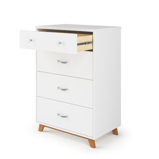 The Child Craft Soho 4 Drawer Chest in White/Natural features wooden legs and silver handles. Displayed against a white background, its top drawer is partially open to reveal the wooden interior.