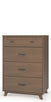 The Child Craft Soho 4 Drawer Chest in Dusty Heather features a mid-century modern design with dark handles, angled legs, two small knobs on the top drawer, and larger handles on the remaining drawers for a stylish nursery accent.