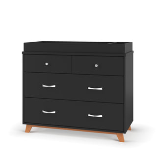 The Child Craft Soho 3-Drawer Dresser in Ebony features a modern design with three spacious drawers, sleek silver handles, and angled wooden legs, shown against a white background.