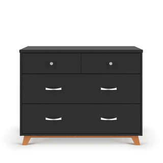 The Child Craft Soho 3-Drawer Dresser in Ebony features a modern design with three drawers, sleek silver handles, and light wooden angled legs, all set against a white background.