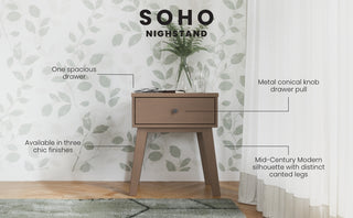 The Child Craft Soho Nightstand in Dusty Heather features a modern silhouette, canted legs, metal conical knob, and spacious drawer. Its three finishes and stylish design make it perfect nursery furniture for rooms with leafy wallpaper and a white curtain.
