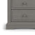 Close-up of the bottom left corner of the Child Craft Jordyn Nightstand in Lunar Gray, showing two drawers with round knobs. The nightstand features a simple, classic design, baby-safe finishes, and a solid base. Ready-to-assemble.