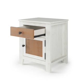 The Child Craft Ocean Grove Nightstand, White/Brown, features a white frame with a light brown drawer and door, black hardware, and nautical farmhouse charm—ideal for nurseries or coastal-inspired spaces.