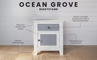 The Child Craft Ocean Grove Nightstand in white/gray features a spacious drawer and cubby, classic rounded pulls, tapered legs, and a distressed two-tone finish.