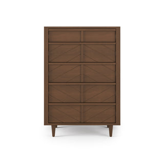 The Child Craft Surrey Hill 5 Drawer Chest in Toasted Chestnut is a tall, modern wooden dresser with five drawers, chevron patterned fronts, and tapered legs, shown against a plain white background.