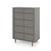The Child Craft Surrey Hill 5 Drawer Chest in Lunar Gray features a tall, modern design with angled legs and geometric drawer fronts, shown on a white background. Clean lines and wooden construction complete its contemporary look.