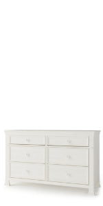 The Child Craft Westgate Double Dresser in Vintage Linen is a white wooden nursery dresser with six drawers in two columns, simple round knobs, and a classic design.