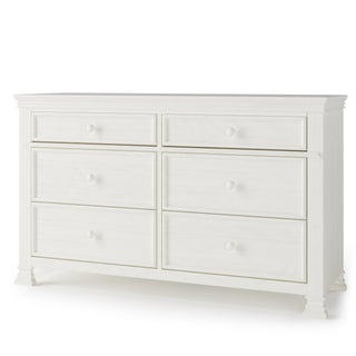 The Child Craft Westgate Double Dresser in Vintage Linen features six drawers with round knobs, classic trim, and slightly raised feet—ideal for a nursery or adding a touch of elegance to any room.