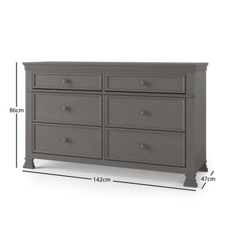 The Child Craft Westgate 4-Piece Nursery Set includes a gray six-drawer dresser with round knobs and decorative feet (86 cm H x 142 cm W x 47 cm D), shown with labeled arrows—ideal for nursery use.