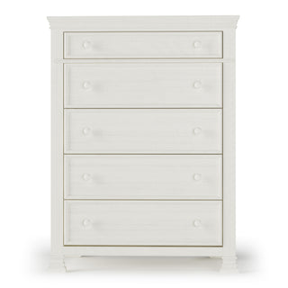 The Child Craft Westgate 5-Drawer Chest in Vintage Linen features round knobs, minimal trim, and four short legs for a timeless, practical nursery storage solution.