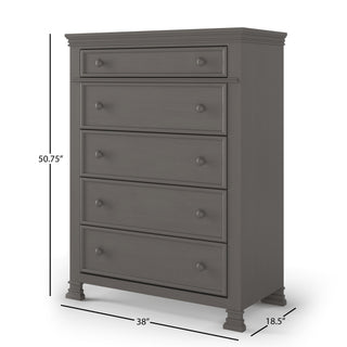 The Child Craft Westgate 5-Drawer Chest in Chelsea Gray features a dark gray finish, five drawers with round knobs, and decorative feet. Dimensions: 50.75"H x 38"W x 18.5"D.