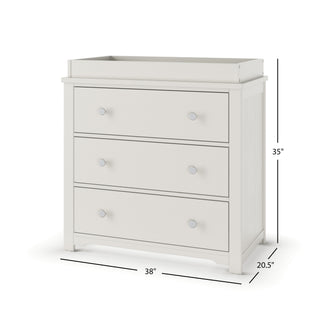 The Child Craft Harmony 3-Drawer Dresser with Changing Table Topper in Brushed Cotton offers nursery storage with three drawers, two round knobs each, and measures 35"H x 38"W x 20.5"D—perfect for any nursery.