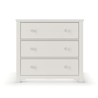 The Child Craft Harmony 3-Drawer Dresser with Changing Table Topper in Brushed Cotton features simple round silver knobs and a sleek white finish—ideal for nursery storage or use with the included topper.