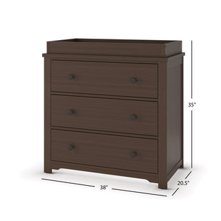 The Child Craft Harmony 3-Drawer Dresser with Changing Table Topper in Brushed Truffle features a dark brown finish, three drawers with round black knobs, and a raised edge top. Dimensions: 35"H x 38"W x 20.5"D.