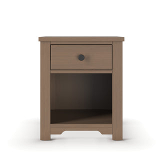 The Child Craft Harmony Nightstand in Dusty Heather features a single drawer with a round black knob, an open shelf below, and child-safe finishes. Shown against a white background.