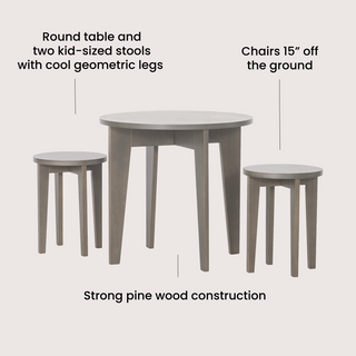 The Child Craft Geo Table and Stools Set in Dapper Gray includes a round pine wood table and two 15-inch-tall kid-sized stools with geometric legs, blending sturdy construction with modern design.