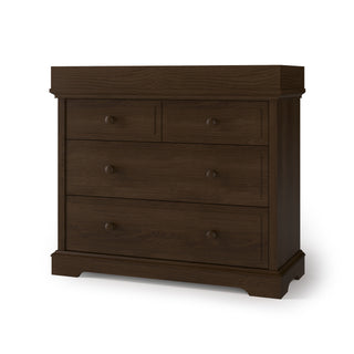 A dark brown wooden dresser with four drawers and round knobs features a classic design. Add the Child Craft F01792 Universal Changing Table Topper in Slate to turn the flat top into a convenient diaper changing station.