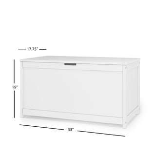 The Child Craft Harmony 33" Kids Toy Box in matte white features a rectangular shape, flat lid, small front cutout handle, and measures 33"W x 17.75"D x 19"H—perfect for simple, stylish storage.