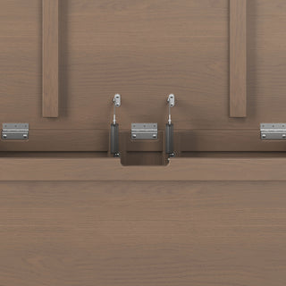 Close-up of the Child Craft Harmony 33" Kids Toy Box in Dusty Heather, showing its wooden frame with metal hinges and spring-loaded pistons, which hint at a convertible design for smooth lid operation and safe toy storage.