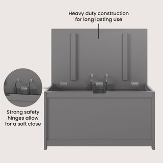 The Child Craft Harmony 33" Kids Toy Box in Cool Gray, shown with its lid open, features heavy-duty construction for long-lasting use and strong safety hinges for a soft-close lid, highlighted in a close-up of the hinges.