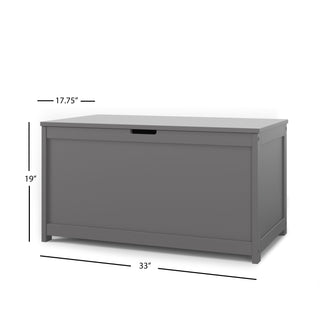 The Child Craft Harmony 33" Kids Toy Box in Cool Gray is a rectangular storage chest with a hinged lid, cutout front handle, and measures 33"W x 19"H x 17.75"D.