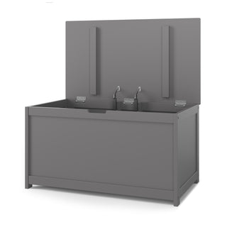 The Child Craft Harmony 33" Kids Toy Box in Cool Gray features a modern design with an open lid, revealing two hydraulic hinges inside. The storage bench is set against a plain white background.