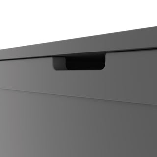 Close-up of the Harmony 33" Kids Toy Box in cool gray by Child Craft, featuring a sleek, modern design with a curved recessed handle against a white background.