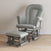 The Child Craft Tranquil Nursery Glider Cushion and matching ottoman feature padded seats and sturdy wooden bases with smooth gliding, shown in gray on a light wood floor against a beige wall.