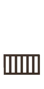 The Child Craft F09501 Toddler Guard Rail in Brushed Truffle is a brown wooden baby gate with vertical slats, designed for Child Craft cribs, shown against a plain white background.