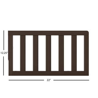 The Child Craft F09501 Toddler Guard Rail in Brushed Truffle features vertical slats and measures 12.25" high by 22" wide. Perfect for crib conversion or pairing with Child Craft cribs; displayed on a white background with measurement lines.