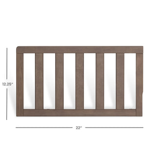 The Child Craft F09501 Toddler Guard Rail in Dusty Heather features vertical slats, measures 12.25"H x 22"W, and fits select Child Craft cribs—perfect for crib conversion. Shown on a white background with labeled dimensions.