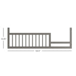 The Child Craft F09502 Toddler Guard Rail in Lunar Gray features vertical slats and side profile, measuring 54.5" long by 12.25" high. Designed for crib conversion kits, it pairs with Child Craft cribs for added safety. Measurement lines show dimensions.