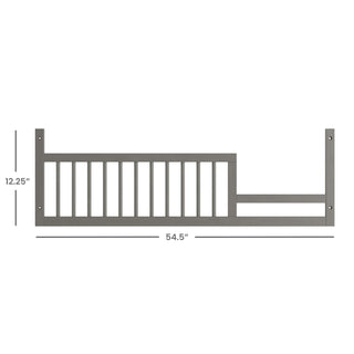 The Child Craft F09502 Toddler Guard Rail in Lunar Gray features vertical slats and side profile, measuring 54.5" long by 12.25" high. Designed for crib conversion kits, it pairs with Child Craft cribs for added safety. Measurement lines show dimensions.