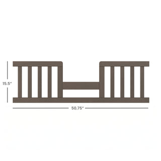 The Child Craft F09514 Toddler Guard Rail in Dapper Grey features vertical slats on both sides, a lower center rail, and measures 15.5" tall x 50.75" wide—perfect for converting a toddler bed or crib.