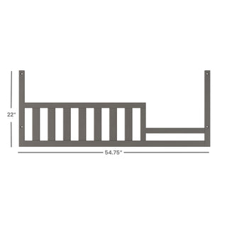 The Child Craft F09554 Toddler Guard Rail in Chelsea Grey measures 22" tall by 54.75" wide, features vertical slats on the left and open space on the right, and easily converts your crib to a toddler bed.