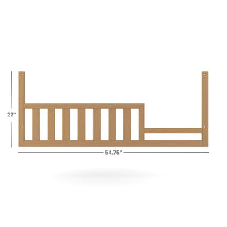 The Child Craft F09554 Toddler Guard Rail in Biscotti, 54.75" long and 22" tall, features left-side vertical slats and a right support bar for Child Craft crib toddler bed conversion, shown against a white background.