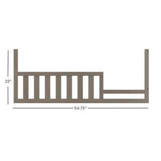 The Child Craft F09554 Toddler Guard Rail in Crescent Gray, measuring 22"H x 54.75"L, fits cribs with vertical slats and two posts—perfect for toddler bed conversion.