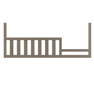 The Child Craft F09554 Toddler Guard Rail in Crescent Gray features a slatted design with four vertical posts, ideal for toddler bed conversion and compatible with select Child Craft cribs.